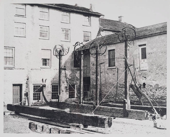 General View of the Large Courtyard with Pioneer Family under Construction