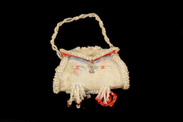 Untitled (Fist purse with floral motif)