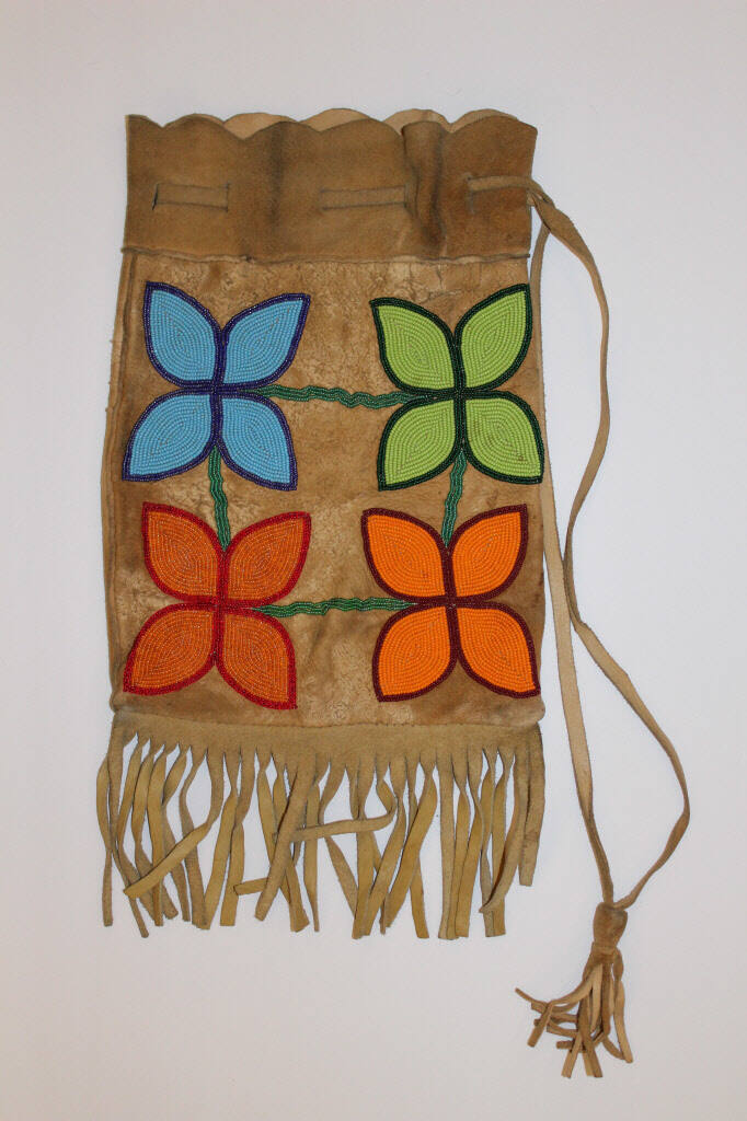 Untitled (Leather bag with floral motif)