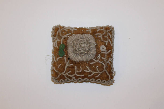 Untitled (Rectangular pincushion with floral motif)