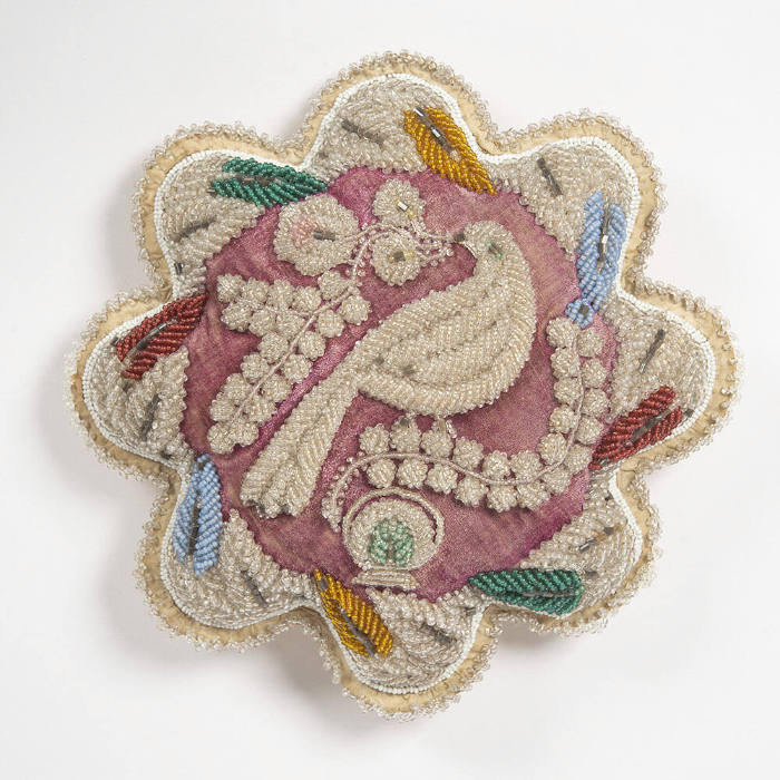 Untitled (Floral-shaped hatpin cushion with bird motif)