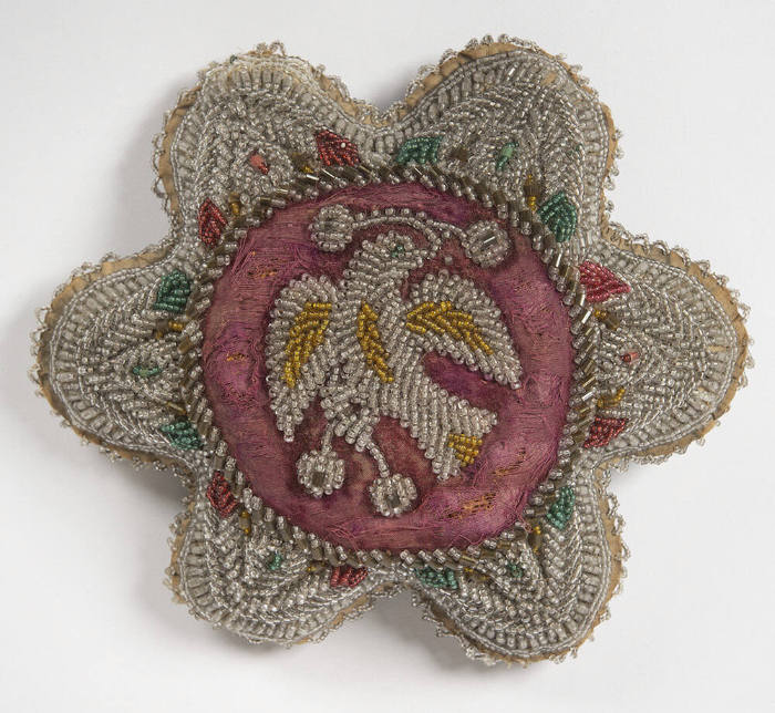 Untitled (Floral-shaped hatpin cushion with bird motif)