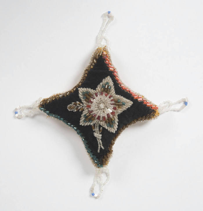 Untitled (Star-shaped pincushion with floral motif)