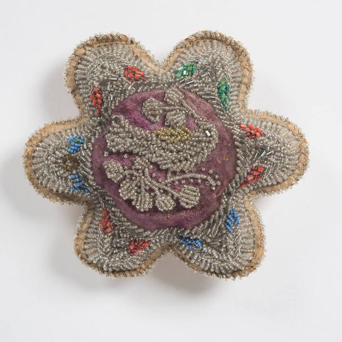 Untitled (Floral-shaped pincushion with bird motif)