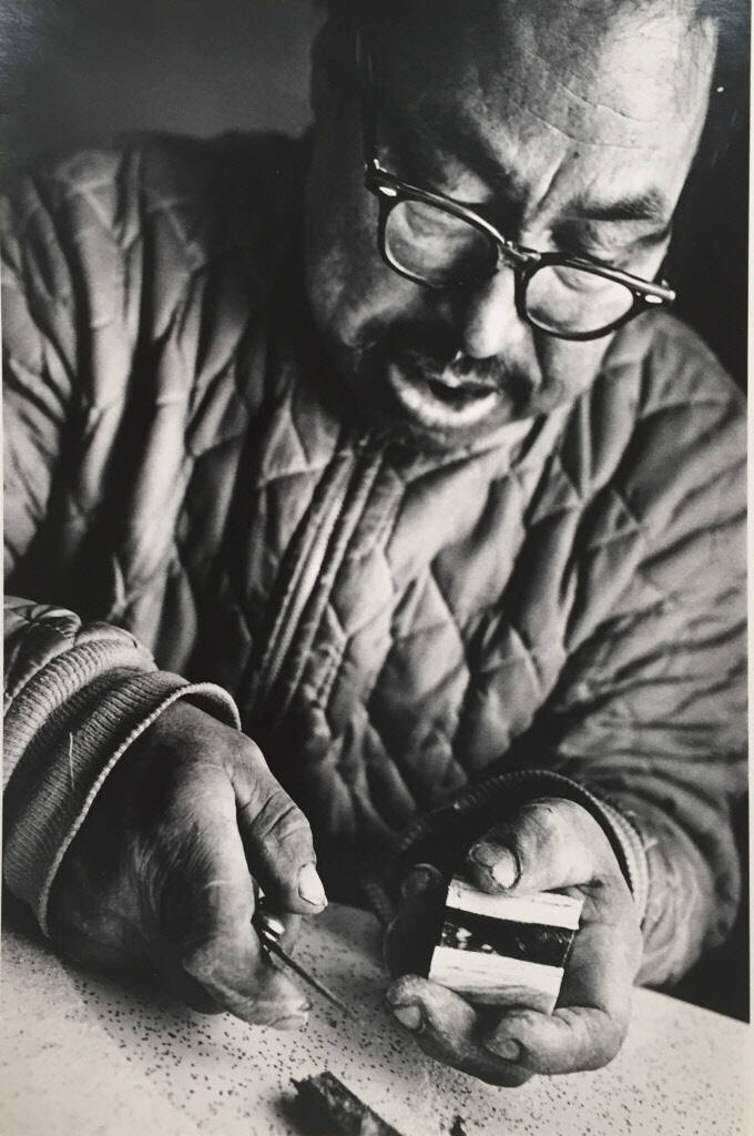 Untitled (Man Holding Knife and Antler Segment)