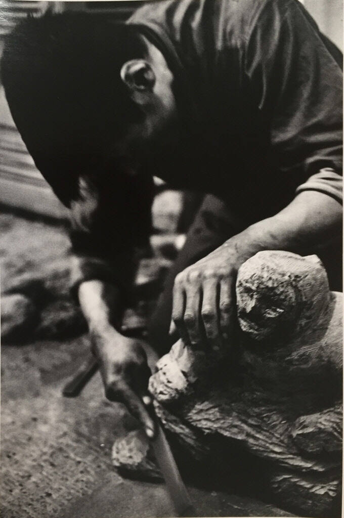 Untitled (Man Shaping Sculpture)