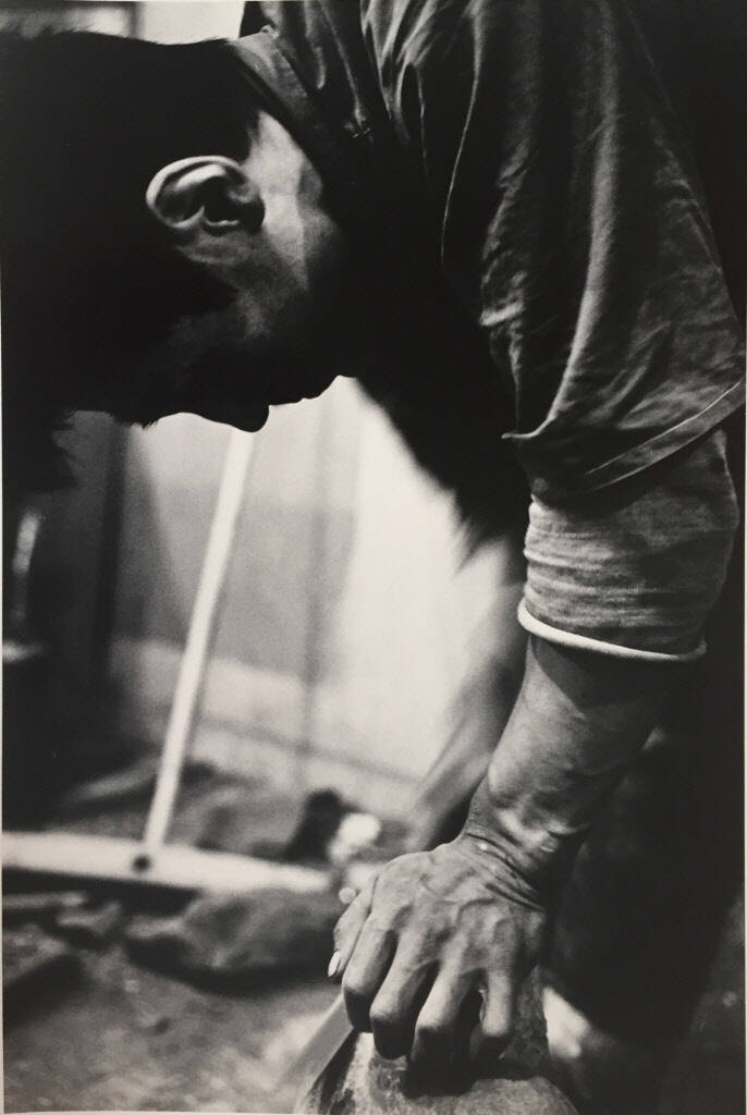 Untitled (Man Shaping Stone)